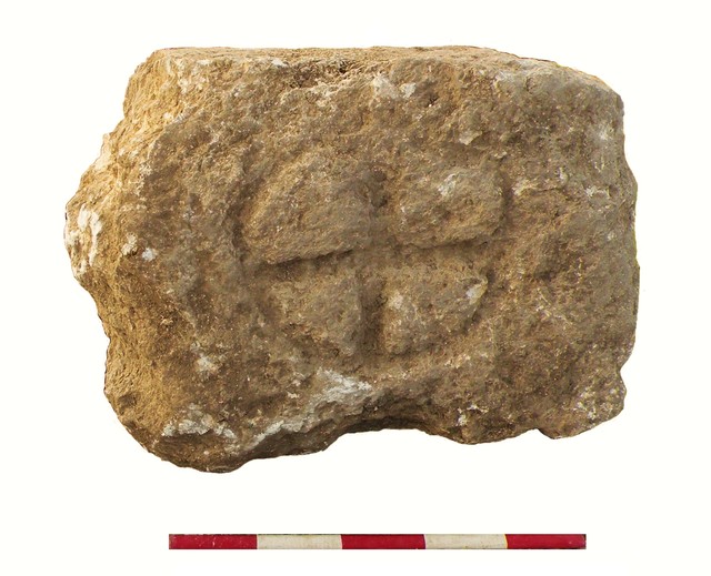Fig. 13b. Trench 2-S: a block with a carved cross (image by Mariusz Burdajewicz).